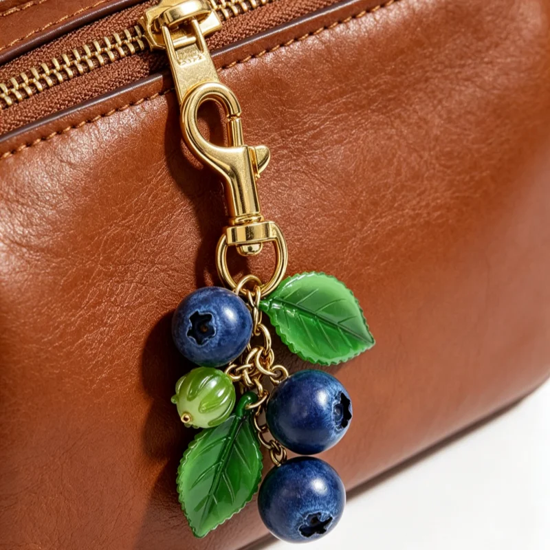 Llavero de resina con forma de - Women'S Young Bags reseña y precio